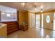 Welcoming entryway featuring tile floors, stairs, and a decorative front door with large glass insert at 6214 Crestview Se Dr, Covington, GA 30014