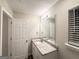 Bathroom with modern granite vanity top and lots of lighting at 408 Kendall Ln, Mcdonough, GA 30253