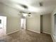 Spacious primary bedroom with neutral carpet, ample natural light, and neutral walls at 408 Kendall Ln, Mcdonough, GA 30253