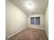 Bedroom with neutral carpet, ample natural light from a large window, and neutral colored walls at 408 Kendall Ln, Mcdonough, GA 30253