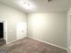 Bedroom with carpeting, double door closet, and a window that provides natural light at 408 Kendall Ln, Mcdonough, GA 30253