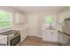 Modern kitchen featuring stainless steel appliances and quartz countertops at 525 Baker Nw Cir, Atlanta, GA 30318
