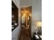 Hallway of home shows carpeted flooring and doorways to other rooms at 8636 Woodside Ln, Jonesboro, GA 30238