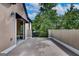 Outdoor balcony with a railing and outdoor living space overlooking lush greenery and a glimpse of the neighborhood at 3641 Ridge Towne Dr, Duluth, GA 30096