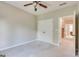 Cozy bedroom with neutral walls, carpeted floors, a closet, and a ceiling fan at 3641 Ridge Towne Dr, Duluth, GA 30096