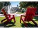 Inviting community space with Adirondack chairs, a fountain, and a view of the clock tower in Downtown Duluth at 3641 Ridge Towne Dr, Duluth, GA 30096