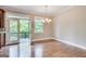 Dining room featuring hardwood floors and direct access to the outdoor deck at 3641 Ridge Towne Dr, Duluth, GA 30096