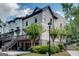 Charming townhome with private deck, two-car garage, and landscaped front yard in a desirable neighborhood at 3641 Ridge Towne Dr, Duluth, GA 30096