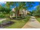 Beautiful townhome exterior featuring manicured landscaping and a charming walkway at 3641 Ridge Towne Dr, Duluth, GA 30096