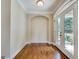 Elegant foyer featuring hardwood floors and ample natural light from the front door at 3641 Ridge Towne Dr, Duluth, GA 30096