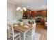Eat-in kitchen featuring stainless steel appliances, hardwood floors and updated lighting at 3641 Ridge Towne Dr, Duluth, GA 30096