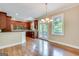 Open kitchen and dining area featuring hardwood floors and stainless appliances at 3641 Ridge Towne Dr, Duluth, GA 30096