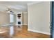 Spacious living room featuring hardwood floors, fireplace, and a ceiling fan at 3641 Ridge Towne Dr, Duluth, GA 30096