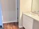 Modern bathroom with granite countertops and white cabinets at 4411 Ward Bluff Ct, Ellenwood, GA 30294