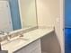 Bathroom vanity with white cabinet, granite countertop, undermount sink, and brushed nickel faucet at 4411 Ward Bluff Ct, Ellenwood, GA 30294