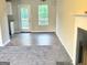 Cozy living area featuring hard surface flooring and a fireplace at 4411 Ward Bluff Ct, Ellenwood, GA 30294