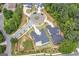 Aerial view of new homes in a neighborhood with a roundabout and beautifully landscaped yards at 115 Thome, Alpharetta, GA 30022