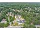 Panoramic aerial view of a residential area with new construction homes surrounded by lush trees at 115 Thome, Alpharetta, GA 30022