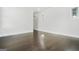 Spacious bedroom with gleaming hardwood floors and a view outside at 115 Thome, Alpharetta, GA 30022
