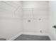 Storage space with wire shelving and tile flooring, perfect for laundry or organization at 115 Thome, Alpharetta, GA 30022