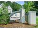 Welcome to Akunna Court, a Piskey Community, beautifully marked with a brick and metal sign at 115 Thome, Alpharetta, GA 30022