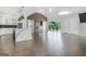 Bright and airy open-concept living space with modern kitchen and large windows at 115 Thome, Alpharetta, GA 30022