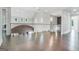 Spacious loft area features modern lighting, glass railing, and ample natural light at 115 Thome, Alpharetta, GA 30022