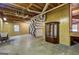 Unfinished basement featuring an open ceiling, concrete floor, shelving unit and vintage display case at 3452 Monica Sw Ln, Conyers, GA 30094