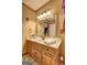 Bathroom features a knotty pine vanity with a white countertop at 3452 Monica Sw Ln, Conyers, GA 30094