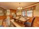 Dining room with views of outdoors and wood flooring at 3452 Monica Sw Ln, Conyers, GA 30094