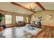 Comfortable living room offering plenty of natural light and access to the outdoors at 3452 Monica Sw Ln, Conyers, GA 30094