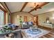 Bright living room showcasing a vaulted ceiling, fireplace, and stylish decor at 3452 Monica Sw Ln, Conyers, GA 30094