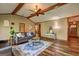 Spacious living room boasting wood floors, vaulted ceilings, and comfortable seating area at 3452 Monica Sw Ln, Conyers, GA 30094