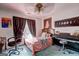 Cozy bedroom with a full size bed, desk, gaming chair, and piano at 221 Ashley Trace Dr, Locust Grove, GA 30248