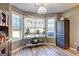 Sunlit dining area with lots of counter space and view of the outdoors through bright windows at 221 Ashley Trace Dr, Locust Grove, GA 30248