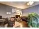 This cozy living room is equipped with a flatscreen tv and comfortable seating at 221 Ashley Trace Dr, Locust Grove, GA 30248