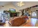 Spacious living room with vaulted ceilings, hardwood floors and bright natural light at 221 Ashley Trace Dr, Locust Grove, GA 30248