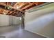 Unfinished basement provides plenty of storage with exposed beams and utilities at 1026 Ponderosa Park Dr, Forest Park, GA 30297