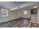 Finished basement offers natural light through multiple windows, and vinyl flooring. Easy access up the stairs and move in ready! at 1026 Ponderosa Park Dr, Forest Park, GA 30297