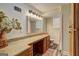 Basement bathroom with granite countertop, stylish mirror, and shower features vinyl floors and plenty of light at 1026 Ponderosa Park Dr, Forest Park, GA 30297