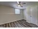 Bedroom features durable vinyl flooring, a window, and a door, offering both comfort and convenience at 1026 Ponderosa Park Dr, Forest Park, GA 30297