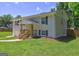 Charming brick home with a covered porch and well-manicured lawn in a quiet neighborhood at 1026 Ponderosa Park Dr, Forest Park, GA 30297