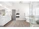 Bright bathroom with soaking tub, walk-in shower, wood-look floors and double vanity at 1596 Fearn Ne Cir, Brookhaven, GA 30319