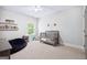 Neutral bedroom with large window, plush carpeting, and simple decor at 1596 Fearn Ne Cir, Brookhaven, GA 30319
