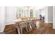 Elegant dining room featuring hardwood floors, natural light, and classic wainscoting at 1596 Fearn Ne Cir, Brookhaven, GA 30319