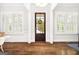 Bright and airy foyer with gleaming hardwood floors and abundant natural light at 1596 Fearn Ne Cir, Brookhaven, GA 30319