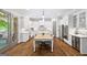 Bright kitchen with stainless appliances, a wine fridge, and an eat in dining area at 1596 Fearn Ne Cir, Brookhaven, GA 30319