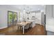 Bright kitchen featuring an island with seating and french doors to covered patio at 1596 Fearn Ne Cir, Brookhaven, GA 30319