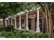 A storefront featuring a brick facade, white columns, HAVEN sign, and well-maintained landscaping at 1596 Fearn Ne Cir, Brookhaven, GA 30319