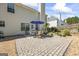 Spacious backyard patio with table and chairs, perfect for outdoor dining and relaxation at 3842 Monticello St, Douglasville, GA 30135